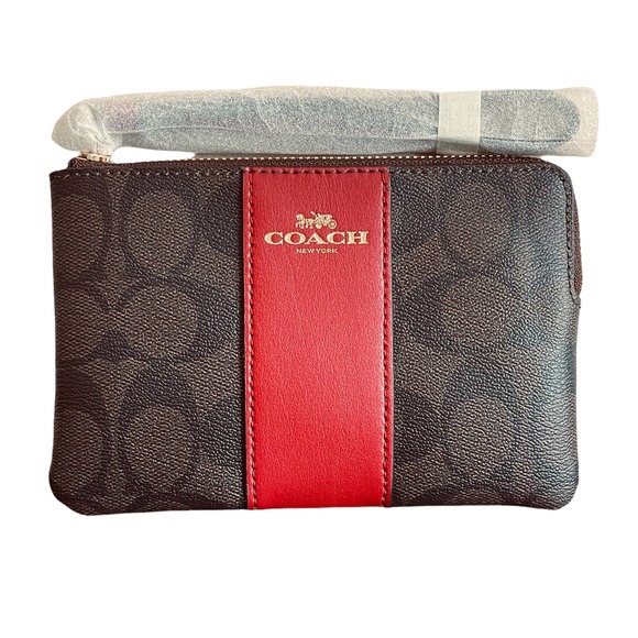 Coach Handbags - Coach Corner Zip Wristlet Signature Coated Canvas Red Colored Leather Stripe